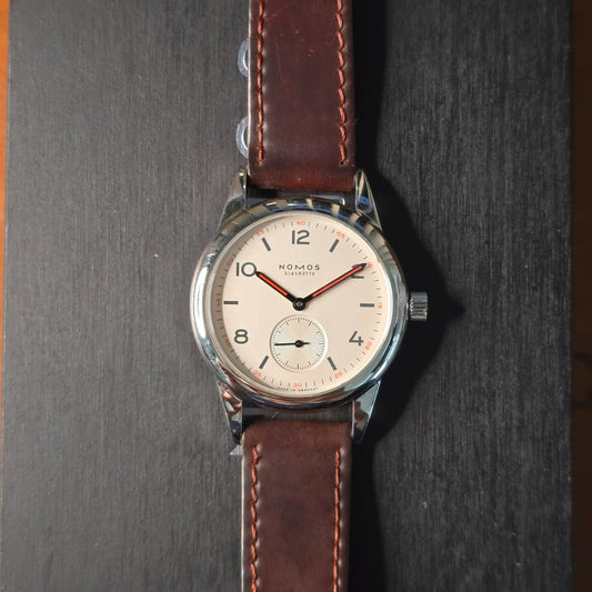 Nomos Club (Consignación)